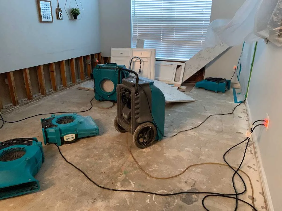 Dehumidifier in flood-cut room for Water Damage Restoration in Kingston